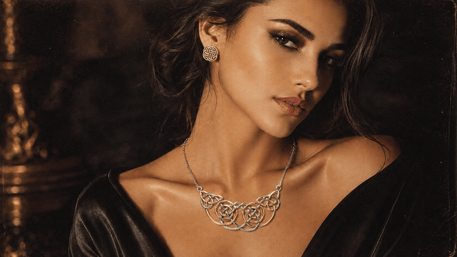 Woman wearing a mixed-metal Celtic knot necklace and gold Celtic knot earrings in a dark retro-inspired editorial portrait.