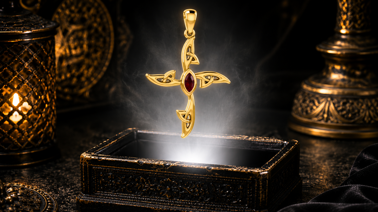 Solid 14K gold contemporary Celtic cross pendant with a garnet gemstone floating above an ornate jewelry box in a refined dark luxury setting with warm candlelight, cinematic lighting, and a mystical atmosphere.
