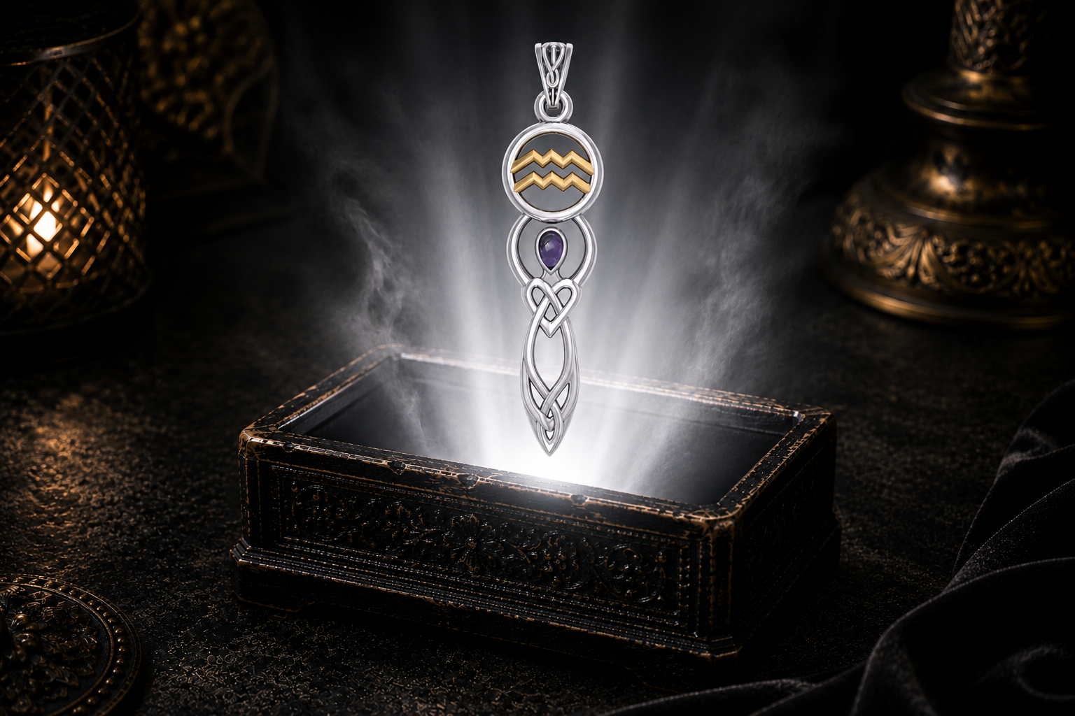 Sterling silver Aquarius zodiac goddess pendant with amethyst and gold accents floating above an ornate jewelry box illuminated by glowing light in a dark luxury setting.
