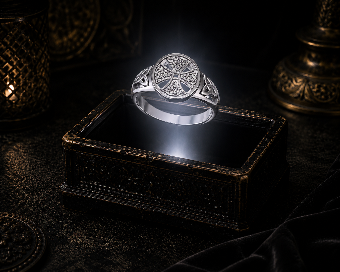 Sterling silver Celtic Cross Triquetra ring with intricate Celtic knotwork displayed on a dark cinematic luxury jewelry background