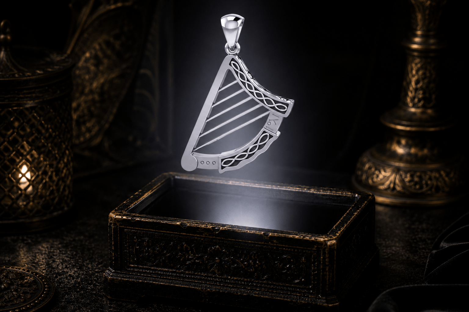 Sterling silver Celtic harp pendant with five openwork strings and repeating figure-eight knotwork
