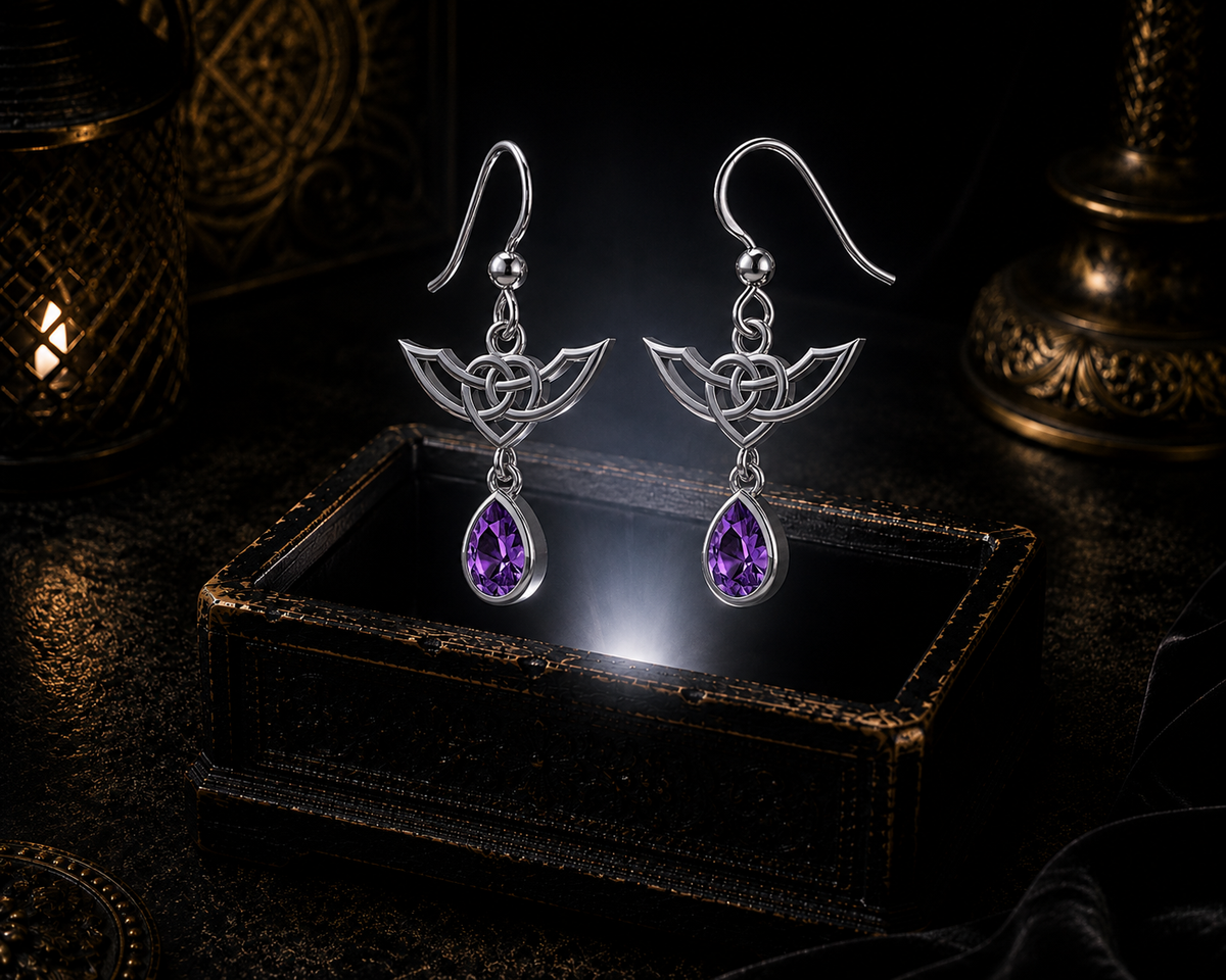 Sterling silver Celtic Infinity Knot earrings with dangling amethyst gemstones floating above a glowing ornate jewelry box in a dark luxurious mystical setting with cinematic lighting