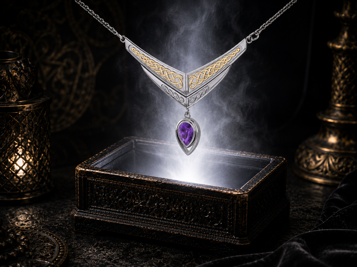 Sterling silver Celtic interlace wing necklace with gold accents and amethyst gemstone floating above an ornate jewelry box surrounded by soft glowing light in a dark luxury setting.