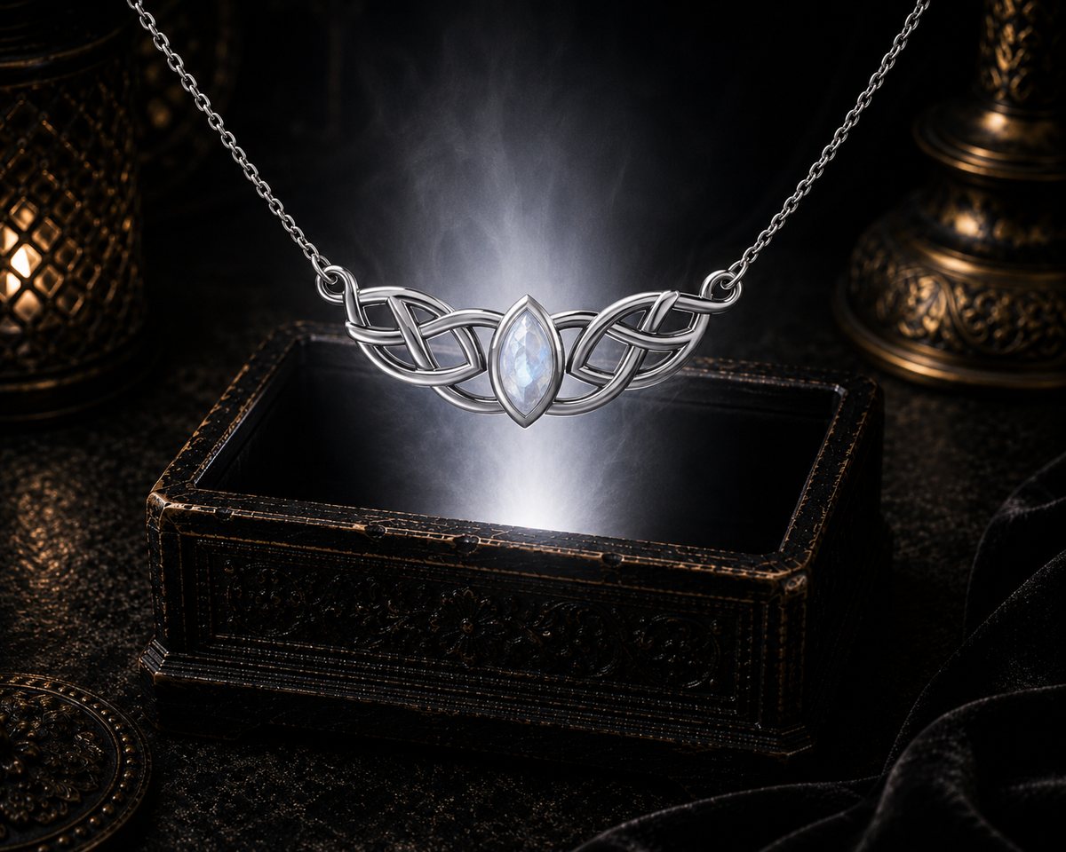 Sterling silver Celtic necklace with rainbow moonstone gemstone floating above a radiant jewelry chest in an elegant cinematic atmosphere