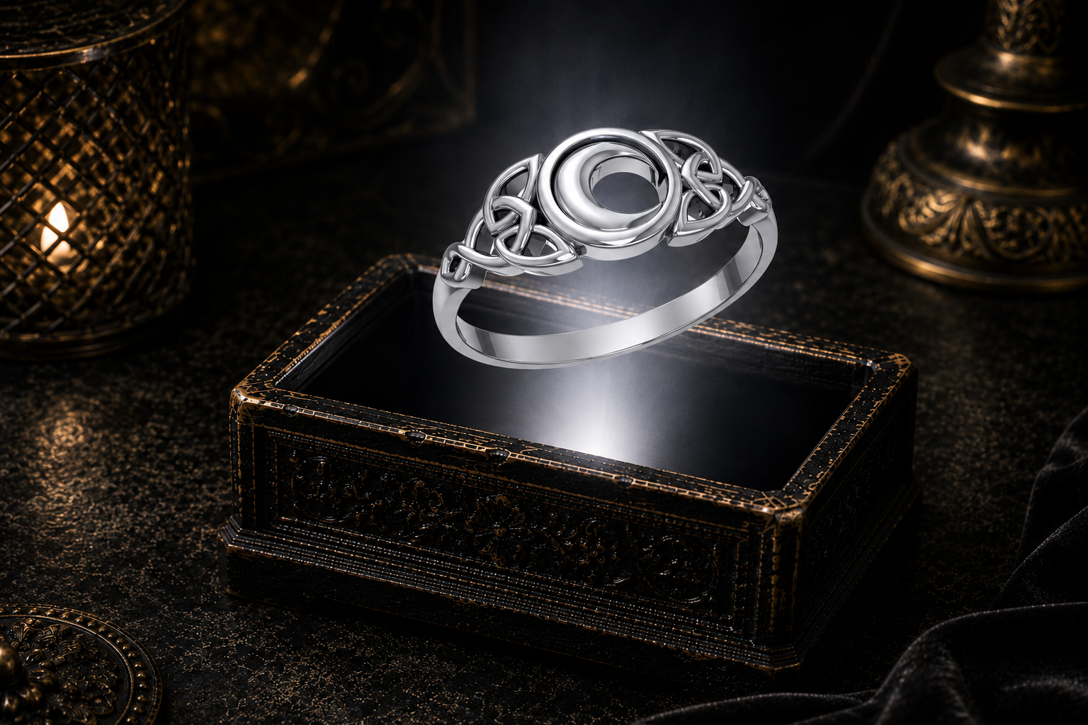 Sterling silver crescent moon Celtic ring suspended above an ornate jewelry box within a soft white beam of light in a cinematic luxury setting.