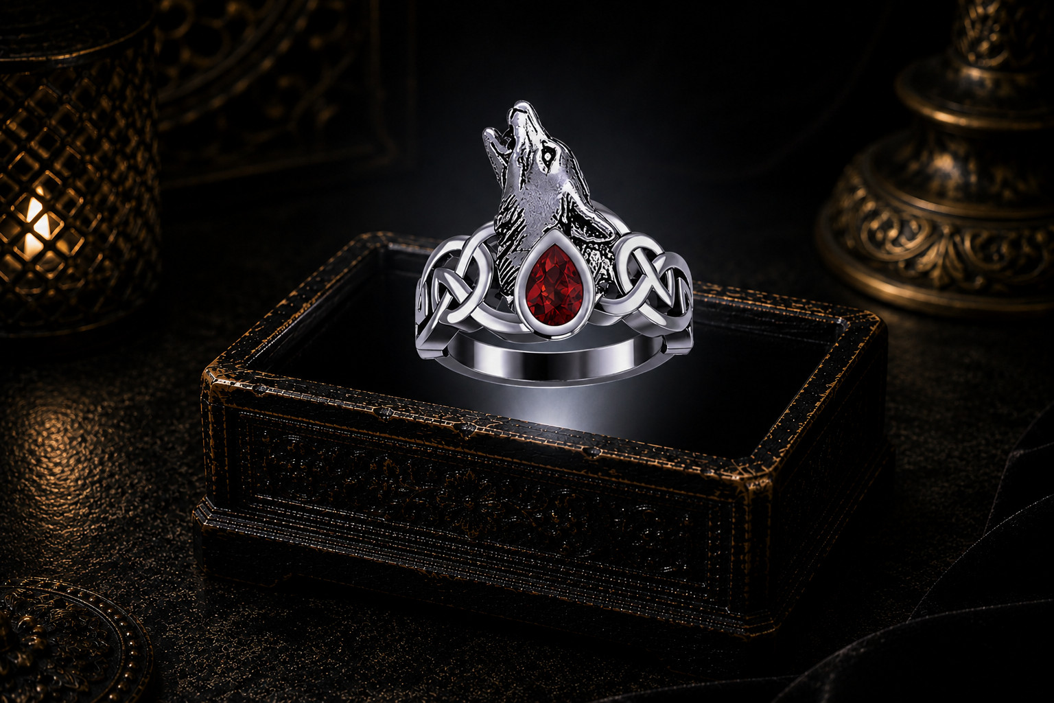 Howling sterling silver Celtic wolf ring with garnet gemstone displayed above a glowing antique jewelry box in a dramatic cinematic scene