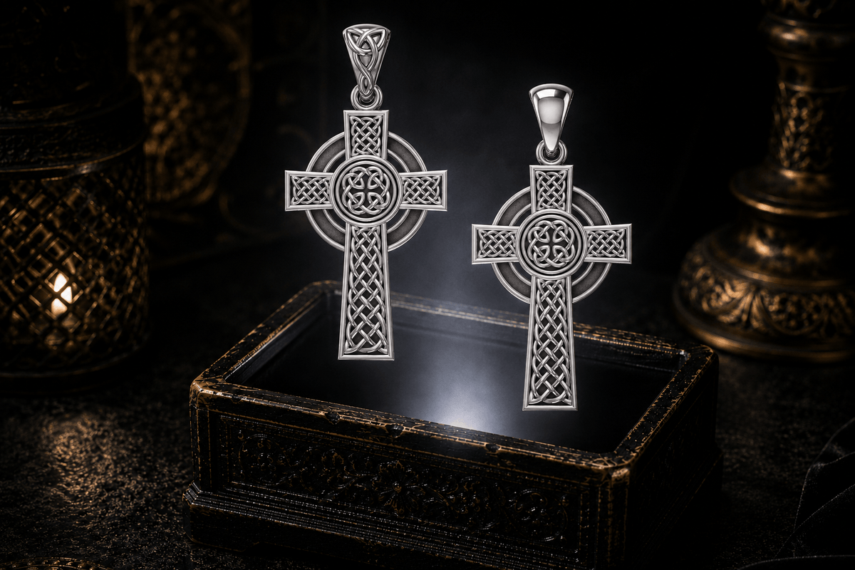Sterling silver Irish Celtic Cross pendant with ringed halo, detailed Celtic knotwork, circular center, and triquetra-decorated bail. Reversible, Double-sided