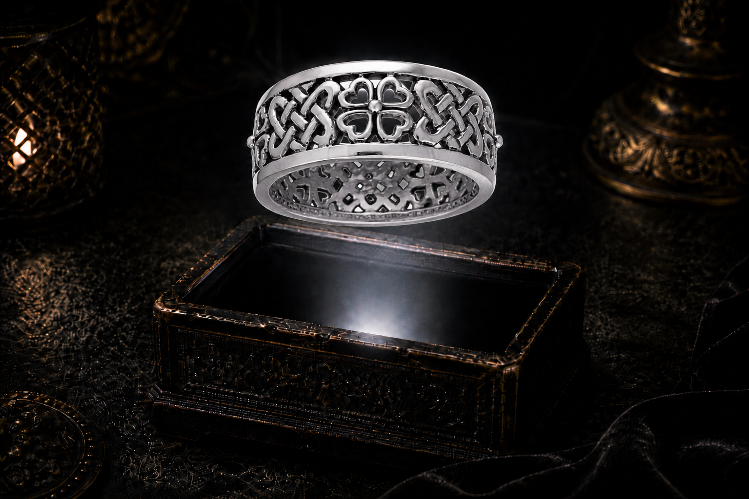 Sterling silver Irish four leaf clover Celtic knot ring floating above an ornate jewelry box in a dark luxury setting with mystical glowing light.