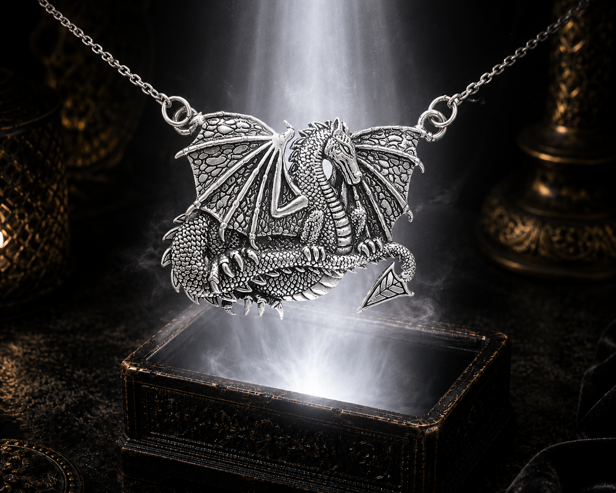 Sterling silver majestic winged dragon necklace floating above an ornate jewelry box surrounded by soft mystical light in a dark luxury setting with cinematic shadows and realistic reflections.