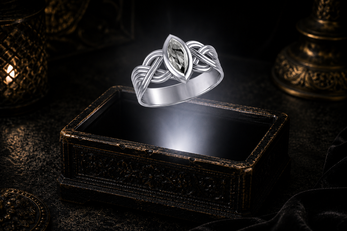 Sterling silver Celtic interwoven strand ring displaying a marquise-cut white cubic zirconia hovering above an ornate jewelry box in a cinematic luxury environment surrounded by soft atmospheric lighting.