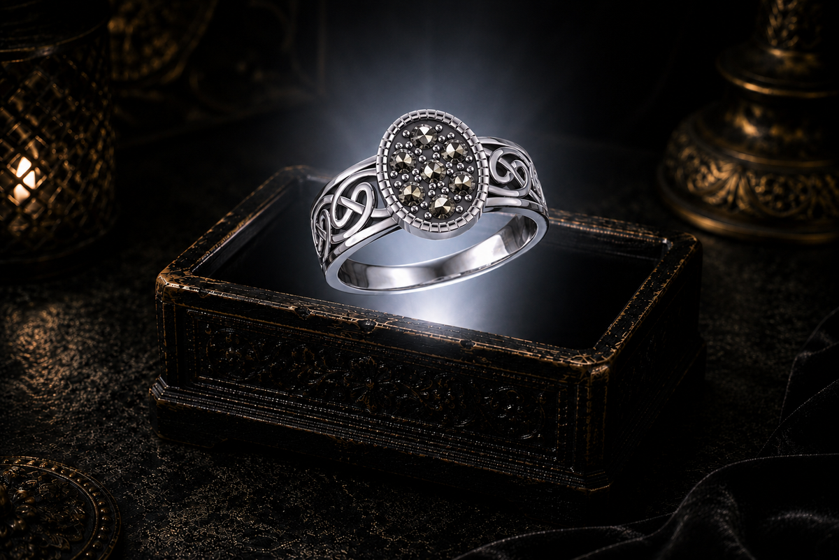 Oval Celtic sterling silver ring with marcasite stud accent gemstones and Celtic knot detailing by Avadore