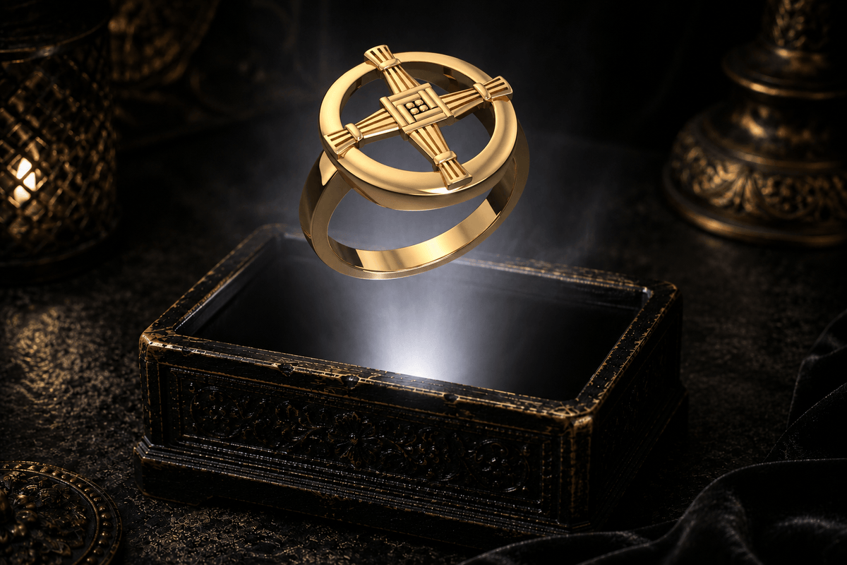 Yellow gold St. Brigid’s cross ring suspended above an ornate jewelry box, with white light beneath the band and fine recessed lines across the cross.