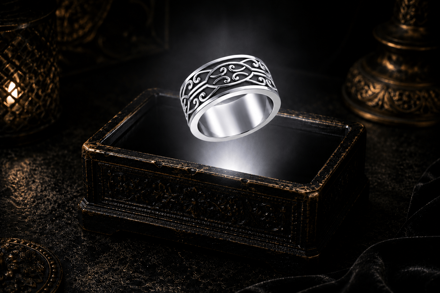 Wide sterling silver Celtic scrollwork band ring suspended above an antique jewelry box within a soft white beam of light in a cinematic luxury setting.