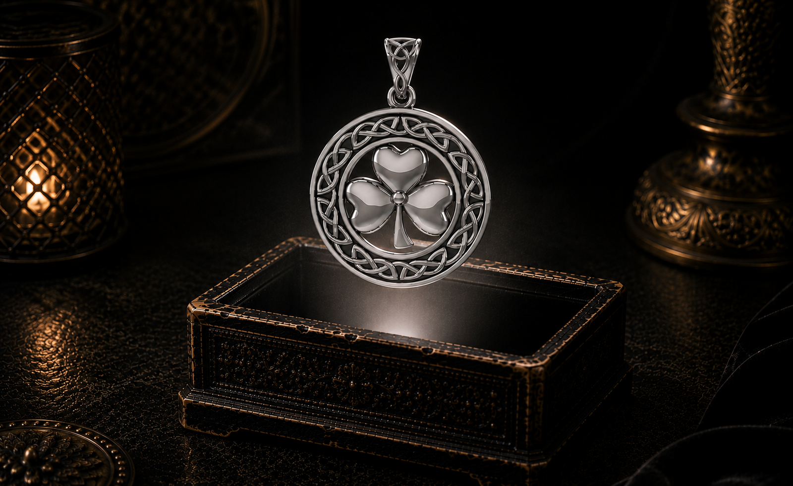 Sterling silver shamrock emblem pendant with Celtic knotwork floating above an ornate jewelry box in a dark luxury setting with mystical glowing light.